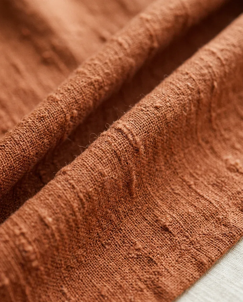 Terracotta linen co-ord — the cloth, close up